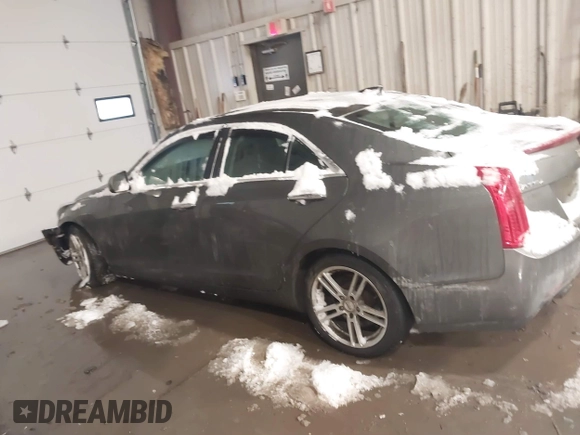 2016 Cadillac ATS Standard AWD z VIN 1G6AG5RX4G0120667, wystawiony jako IAAI lot #41512947 z przebiegiem 106 209 mil mil oraz . Historia ofert i sprzedaży dostępna na DreamBid. Obrazek 14.