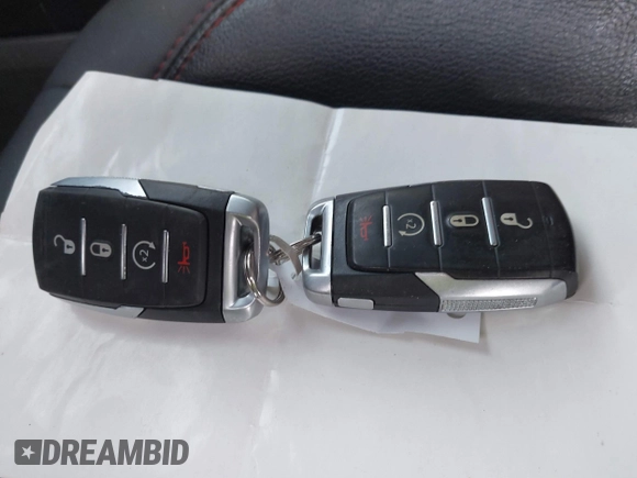 2022 Ram 1500 Rebel z VIN 1C6SRFLT9NN204868, wystawiony jako IAAI lot #41351273 z przebiegiem 67 120 mil mil oraz . Historia ofert i sprzedaży dostępna na DreamBid. Obrazek 11.