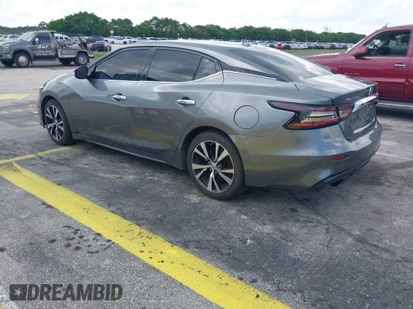 2020 Nissan Maxima SV z VIN 1N4AA6CV6LC373659, wystawiony jako IAAI lot #42347264 z przebiegiem 77 812 mil mil oraz . Historia ofert i sprzedaży dostępna na DreamBid. Obrazek 3.