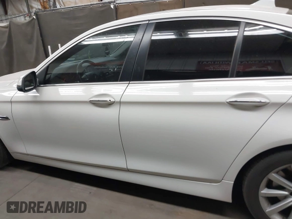 2014 BMW 5 Series 535i with VIN WBA5B1C59ED477343, listed as a IAAI auction lot 42396585 with 158,353 mi miles and . Bid and sale history available at DreamBid. Image 14.