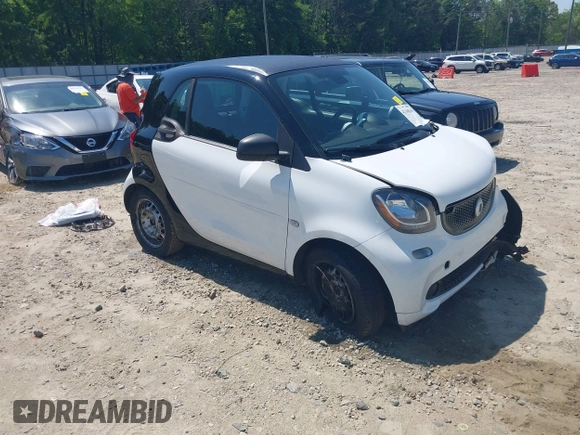 2016 Smart fortwo Passion z VIN WMEFJ5DA6GK078340, wystawiony jako IAAI lot #42140363 z przebiegiem 114 647 mil mil oraz . Historia ofert i sprzedaży dostępna na DreamBid. Obrazek 1.