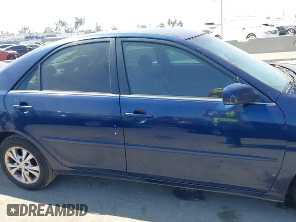 2005 Toyota Camry LE with VIN 4T1BF32K25U101690, listed as a IAAI auction lot 40453083 with 246,087 mi miles and . Bid and sale history available at DreamBid. Image 12.
