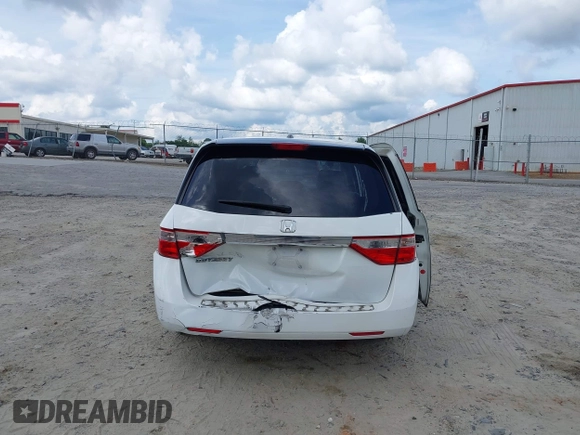 2011 Honda Odyssey EX-L with VIN 5FNRL5H67BB011070, listed as a IAAI auction lot 42491685 with 200,671 mi miles and . Bid and sale history available at DreamBid. Image 16.
