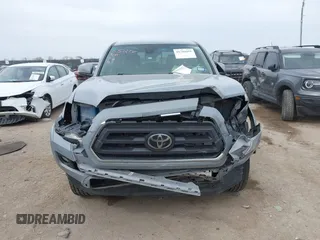 2021 Toyota Tacoma 4WD SR with VIN 5TFCZ5AN3MX260853, listed as a IAAI auction lot 41784451 with 122,244 mi miles. Bid and sale history available at carsss.com. Image 6.
