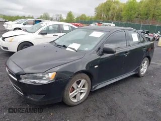 2014 Mitsubishi Lancer SE with VIN JA32V2FW5EU005615, listed as a IAAI auction lot 42204917 with 141,285 mi miles and . Bid and sale history available at carsss.com. Image 2.