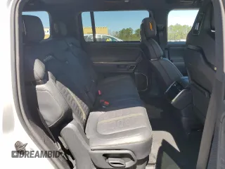 2024 Rivian R1S Adventure z VIN 7PDSGABA7RN034025, wystawiony jako Copart lot #49332795 z przebiegiem Nie podano mil oraz Szkody całkowita. Historia ofert i sprzedaży dostępna na DreamBid. Obrazek 11.