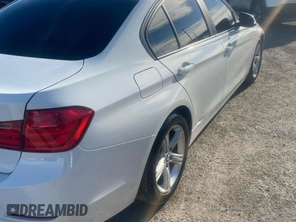 2013 BMW 3 Series 320i with VIN WBA3B1C56DK130229, listed as a Copart auction lot 46759105 with 170,943 mi miles and Salvage Title. Bid and sale history available at carsss.com. Image 3.
