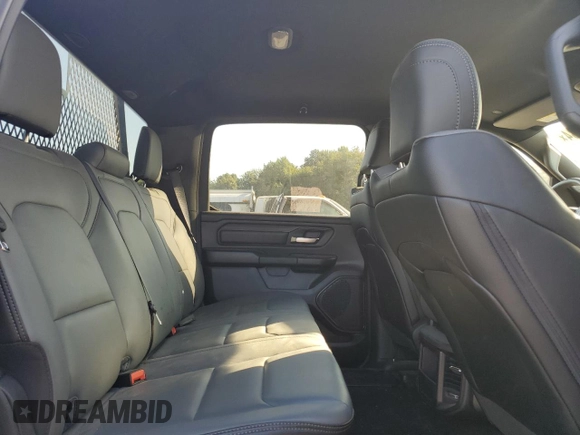 2024 Ram 1500 Tradesman z VIN 1C6SRFNT0RN225627, wystawiony jako Copart lot #69763084 z przebiegiem 4 563 mil mil oraz Szkoda całkowita • Salvage title. Historia ofert i sprzedaży dostępna na DreamBid. Obrazek 10.