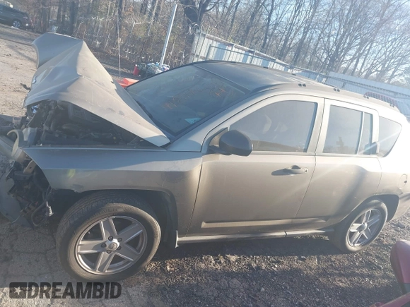2007 Jeep Compass Sport with VIN 1J8FT47W57D158543, listed as a IAAI auction lot 41817636 with 241,439 mi miles. Bid and sale history available at carsss.com. Image 14.