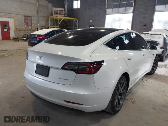 2020 Tesla Model 3 Long Range z VIN 5YJ3E1EB9LF622214, wystawiony jako IAAI lot #41351132 z przebiegiem 133 805 mil mil oraz . Historia ofert i sprzedaży dostępna na DreamBid. Obrazek 16.