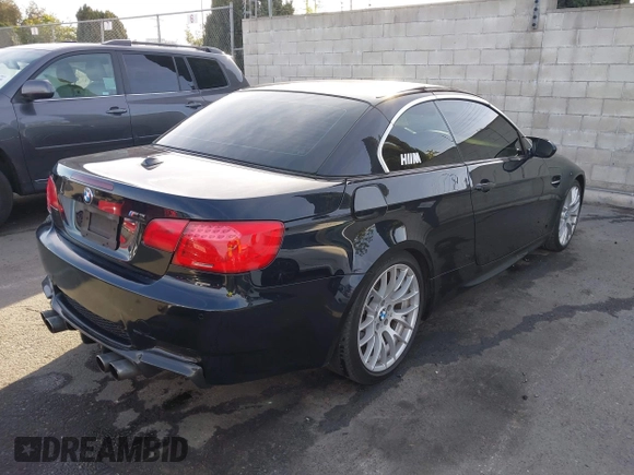 2011 BMW M3 with VIN WBSDX9C50BE584780, listed as a IAAI auction lot 41603749 with 156,141 mi miles. Bid and sale history available at carsss.com. Image 4.