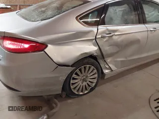 2015 Ford Fusion SE Hybrid with VIN 3FA6P0LU4FR151040, listed as a IAAI auction lot 41376155 with 120,486 mi miles. Bid and sale history available at carsss.com. Image 6.
