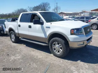2004 Ford F-150 XLT with VIN 1FTPW14534KB89813, listed as a IAAI auction lot 41827133 with 245,541 mi miles. Bid and sale history available at carsss.com. Image 1.