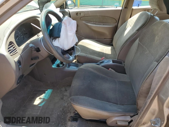 1998 Ford Escort SE with VIN 1FAFP13P7WW266180, listed as a Copart auction lot 61625005 with 143,982 mi miles and Salvage title. Bid and sale history available at DreamBid. Image 7.
