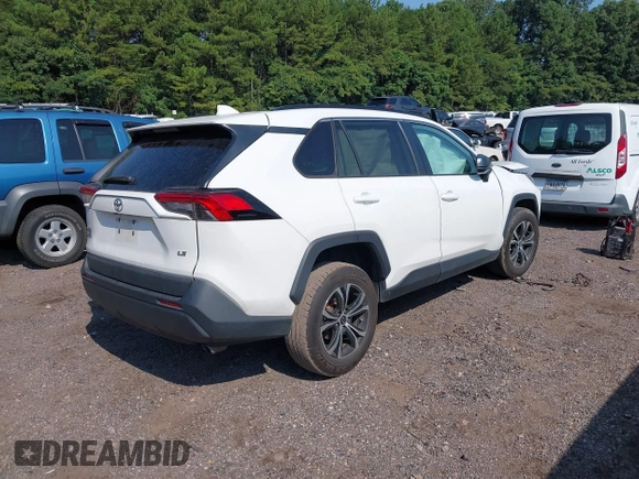 2020 Toyota RAV4 LE with VIN 2T3H1RFV1LC062449, listed as a IAAI auction lot 40064208 with 92,576 mi miles and . Bid and sale history available at DreamBid. Image 4.