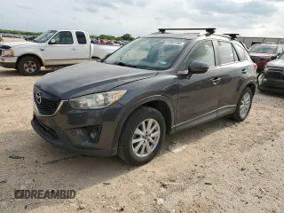 2015 Mazda CX-5 Touring with VIN JM3KE4CY0F0517821, listed as a Copart auction lot 53937195 with 165,852 mi miles and Salvage Title. Bid and sale history available at DreamBid. Image 1.