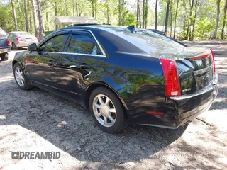 2009 Cadillac CTS RWD w/1SB with VIN 1G6DU57V590105458, listed as a IAAI auction lot 42139093 with 105,983 mi miles. Bid and sale history available at carsss.com. Image 3.