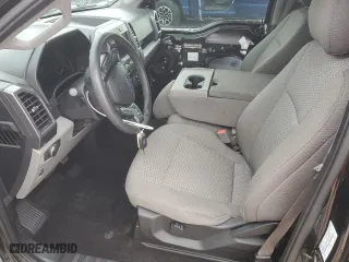 2019 Ford F-150 XL with VIN 1FTEW1E52KFA20992, listed as a Copart auction lot 49848465 with 100,975 mi miles and Salvage Title. Bid and sale history available at carsss.com. Image 7.