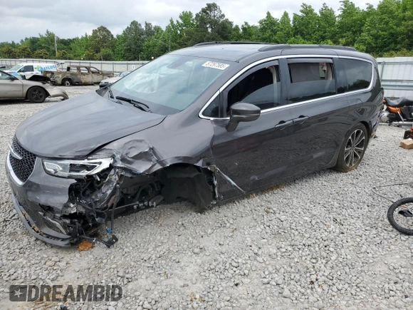 2021 Chrysler Pacifica Touring with VIN 2C4RC1FGXMR550164, listed as a Copart auction lot 57297585 with 10,222 mi miles and Salvage title. Bid and sale history available at DreamBid. Image 1.