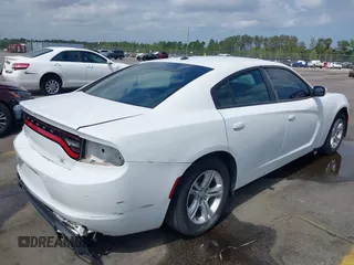 2020 Dodge Charger SXT with VIN 2C3CDXBG7LH100685, listed as a IAAI auction lot 41891270 with 129,277 mi miles. Bid and sale history available at carsss.com. Image 4.