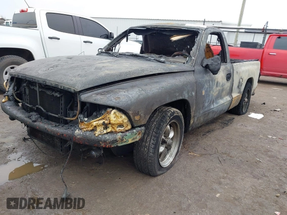 1998 Dodge Dakota SLT with VIN 1B7FL26X6WS656704, listed as a IAAI auction lot 41418285 with Not provided miles and . Bid and sale history available at DreamBid. Image 2.