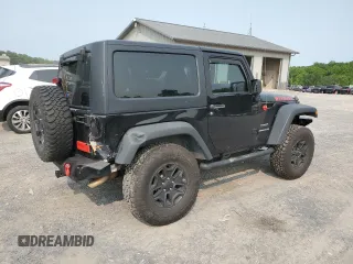 2013 Jeep Wrangler Sport z VIN 1C4AJWAG5DL671491, wystawiony jako Copart lot #59306745 z przebiegiem 111 778 mil mil oraz Szkoda całkowita • Salvage title. Historia ofert i sprzedaży dostępna na DreamBid. Obrazek 3.