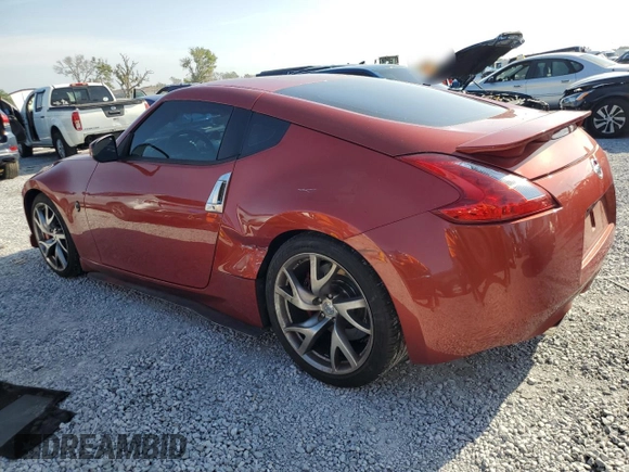 2013 Nissan 370Z with VIN JN1AZ4EH5DM382852, listed as a Copart auction lot 51109385 with 106,940 mi miles and Salvage Title. Bid and sale history available at carsss.com. Image 2.