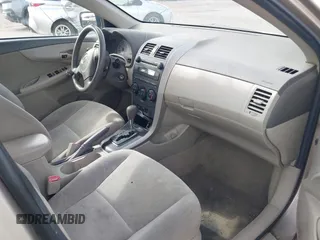 2009 Toyota Corolla with VIN 1NXBU40E09Z078912, listed as a IAAI auction lot 42381759 with 202,353 mi miles and . Bid and sale history available at DreamBid. Image 5.