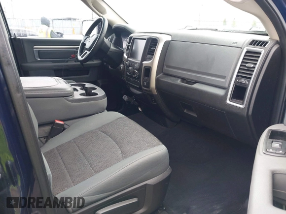2015 Ram 1500 Outdoorsman z VIN 1C6RR7GT6FS508211, wystawiony jako IAAI lot #42044889 z przebiegiem 125 774 mil mil oraz . Historia ofert i sprzedaży dostępna na DreamBid. Obrazek 5.
