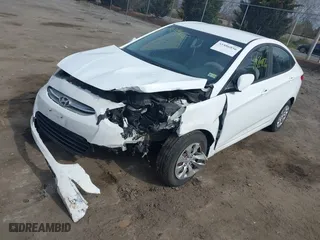 2016 Hyundai Accent SE with VIN KMHCT4AE2GU105708, listed as a IAAI auction lot 41886856 with 146,800 mi miles. Bid and sale history available at carsss.com. Image 2.