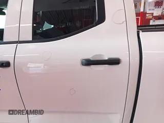 2022 Toyota Tundra SR with VIN 5TFKB5DAXNX006096, listed as a IAAI auction lot 42727998 with 44,389 mi miles and . Bid and sale history available at DreamBid. Image 14.