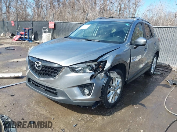 2014 Mazda CX-5 Grand Touring with VIN JM3KE2DY8E0375025, listed as a IAAI auction lot 41657755 with 103,601 mi miles. Bid and sale history available at carsss.com. Image 2.