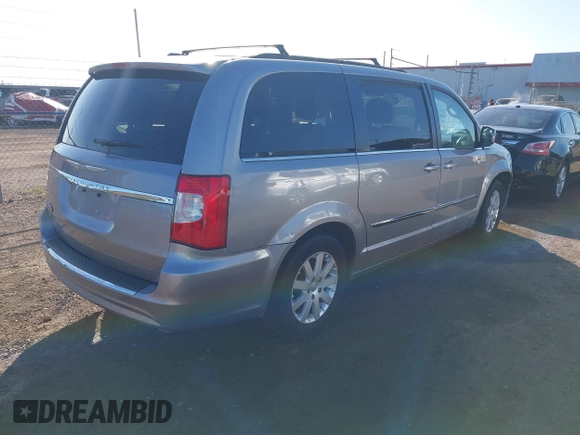 2014 Chrysler Town & Country Touring with VIN 2C4RC1BGXER270140, listed as a IAAI auction lot 41068771 with 144,820 mi miles. Bid and sale history available at carsss.com. Image 4.