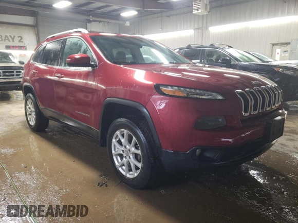 2015 Jeep Cherokee Latitude with VIN 1C4PJMCS5FW624799, listed as a Copart auction lot 52339795 with 142,681 mi miles and Salvage Title. Bid and sale history available at DreamBid. Image 4.
