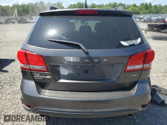 2015 Dodge Journey SXT with VIN 3C4PDDBG8FT715799, listed as a Copart auction lot 61681915 with 128,164 mi miles and Clean title. Bid and sale history available at DreamBid. Image 6.