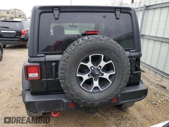 2021 Jeep Wrangler Rubicon z VIN 1C4HJXCG2MW665809, wystawiony jako Copart lot #84007354 z przebiegiem Nie podano mil oraz Szkoda całkowita • Salvage title. Historia ofert i sprzedaży dostępna na DreamBid. Obrazek 6.