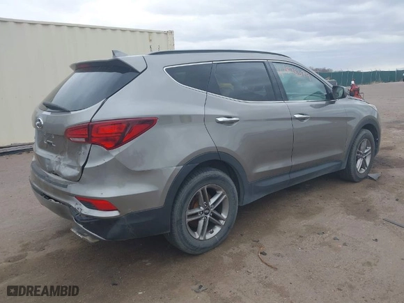 2017 Hyundai Santa Fe Sport 2.4L with VIN 5XYZU3LB0HG424780, listed as a IAAI auction lot 41878679 with 112,739 mi miles. Bid and sale history available at carsss.com. Image 4.