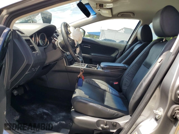 2015 Mazda CX-9 Touring with VIN JM3TB2CA6F0453398, listed as a Copart auction lot 55897115 with 167,563 mi miles and Salvage title. Bid and sale history available at DreamBid. Image 7.