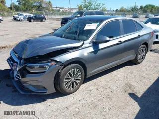 2019 Volkswagen Jetta SEL with VIN 3VWE57BUXKM242727, listed as a IAAI auction lot 41827327 with 91,898 mi miles. Bid and sale history available at carsss.com. Image 2.