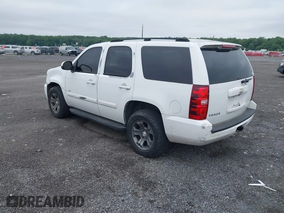 2007 Chevrolet Tahoe LTZ with VIN 1GNFK13007J149042, listed as a IAAI auction lot 42593189 with 216,791 mi miles and . Bid and sale history available at DreamBid. Image 3.