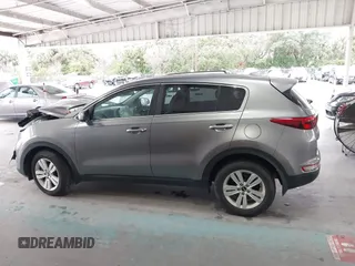 2019 Kia Sportage LX with VIN KNDPM3AC0K7561130, listed as a IAAI auction lot 41391657 with 152,728 mi miles and . Bid and sale history available at carsss.com. Image 14.