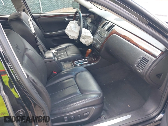 2009 Cadillac DTS 1SC z VIN 1G6KD57Y29U141800, wystawiony jako IAAI lot #42190874 z przebiegiem 115 043 mil mil oraz . Historia ofert i sprzedaży dostępna na DreamBid. Obrazek 5.