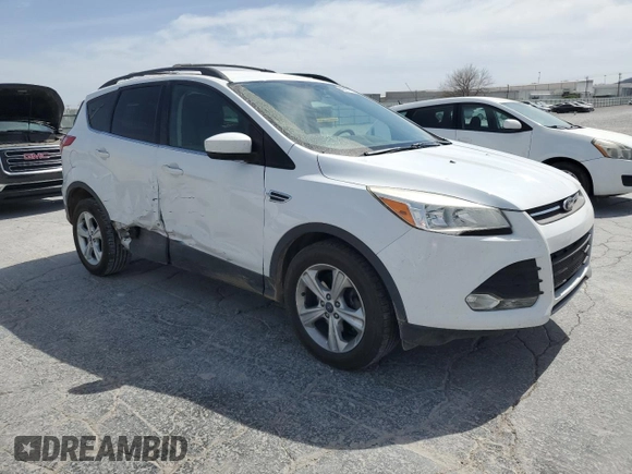2014 Ford Escape SE with VIN 1FMCU0GX1EUA10004, listed as a Copart auction lot 49073255 with 121,900 mi miles and Salvage Title. Bid and sale history available at carsss.com. Image 4.