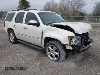 2014 Chevrolet Tahoe LTZ z VIN 1GNSCCE05ER101331, wystawiony jako IAAI lot #41793150 z przebiegiem 177 769 mil mil oraz . Historia ofert i sprzedaży dostępna na DreamBid. Obrazek 1.