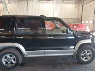 2001 Isuzu Trooper S with VIN JACDJ58X917J09299, listed as a IAAI auction lot 41296724 with 131,829 mi miles and . Bid and sale history available at DreamBid. Image 13.