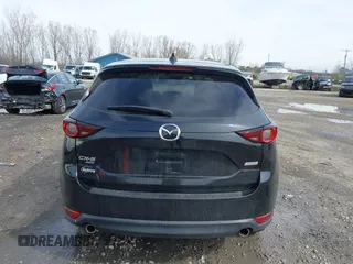 2018 Mazda CX-5 Touring with VIN JM3KFBCMXJ0438177, listed as a IAAI auction lot 42152275 with 65,434 mi miles and . Bid and sale history available at carsss.com. Image 16.