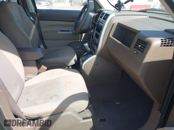 2008 Jeep Patriot Sport with VIN 1J8FF28W98D785130, listed as a IAAI auction lot 42069574 with 180,092 mi miles. Bid and sale history available at carsss.com. Image 5.