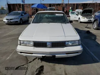 1996 Oldsmobile Cutlass Ciera 1SA VX5 z VIN 1G3AJ55M3T6365624, wystawiony jako Copart lot #47762334 z przebiegiem 142 058 mil mil oraz Szkody całkowita. Historia ofert i sprzedaży dostępna na DreamBid. Obrazek 5.
