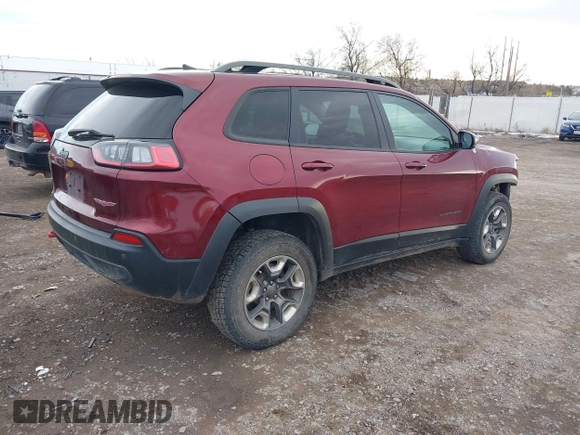 2019 Jeep Cherokee Trailhawk Elite with VIN 1C4PJMBX3KD483704, listed as a IAAI auction lot 40994848 with 176,770 mi miles. Bid and sale history available at carsss.com. Image 4.