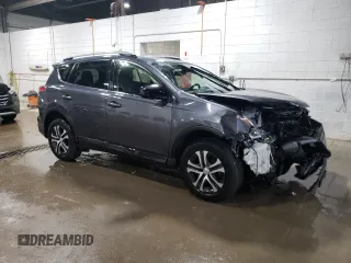 2018 Toyota RAV4 LE with VIN JTMBFREV1JD248395, listed as a Copart auction lot 51752305 with 62,161 mi miles and Salvage Title. Bid and sale history available at DreamBid. Image 4.